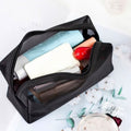 trousse de maquillage transparente